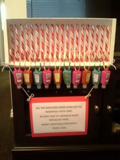 an old fashioned machine with candy canes attached to it's front and sides