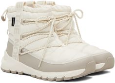 Ankle-high quilted ThermoBall™ Eco-insulated recycled PET ripstop boots in white. Water-repellent non-PFC DWR coating. · Waterproof DryVent™ membrane · Lace-up closure · Logo-woven webbing trim at sides · Bungee-style drawstring at collar · Pull-loop at heel counter · Cushioned OrthoLite® Eco LT™ footbed · Faux-fur lining · EVA foam rubber midsole · Treaded rubber outsole Supplier color: Gardenia white/Silver grey Functional White High-top Boots, White Lace-up Waterproof Boots For Outdoor Activities, Functional White Waterproof Boots, White High-top Sporty Waterproof Boots, Sporty White High-top Waterproof Boots, White High-top Waterproof Boots For Outdoor Activities, White Weatherproof Boots For Outdoor, White High-top Waterproof Boots For Outdoor, White Waterproof Boots For Outdoor