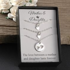 "A Beautiful sterling silver heart necklace set for mother and daughters. Two necklaces come with a tiny heart that fits perfectly inside of the larger heart cut-out circle necklace. This comes with a 14\", 16\", 18\", or 20\" sterling silver flat cable chain. Please convo me for a quote on a longer chain. To add birthstones to this set, you can choose from one of these listings: https://www.etsy.com/shop/DivineJewelrybyMary?section_id=15353062&ref=shopsection_leftnav_4 I also have a tiny in Hypoallergenic Necklace Gift For Mother's Day, Hypoallergenic Necklace For Mother's Day Gift, Hypoallergenic Sterling Silver Necklace For Mother's Day, Hypoallergenic Sterling Silver Necklaces For Mother's Day, Double Heart Charm Necklaces For Wedding And Mother's Day, Dainty Silver Charm Necklace For Mom, Hypoallergenic Necklaces For Mother's Day, Heart-shaped Hypoallergenic Jewelry For Mom, Hypoallergenic Heart-shaped Jewelry Gift For Mom