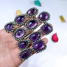 DESCRIPTION Gemstone Name : Natural Star Amethyst  Cut : Collet Ring  Shape : Mix Shape & Size  Length : Between 6 to 8 US (approx.) Plating : Silver Plated Style : Statement Ring/Wedding Ring/Gift Ring Country/Region of Manufacture : India Made In : Jaipur Rajasthan  https://www.etsy.com/in-en/shop/MadinaJewelz?ref=seller-platform-mcnav The pictures shown are of the actual product that you will receive. Please note stone colors may look slightly different depending on your monitor calibration. Luxury Purple Agate Jewelry, Luxury Amethyst Brooch As A Gift, Crystal Amethyst, Country Rings, Ring Crystal, Ring Shapes, Rings For Girls, Jaipur Rajasthan, Gift Ring