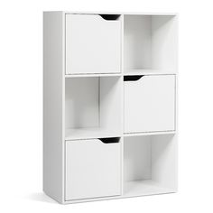 a white bookcase with four bins on top