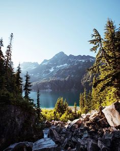 a mountain lake surrounded by trees and rocks