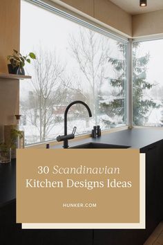 a kitchen sink sitting under a window with the words 30 scandinavian kitchen designs ideas on it