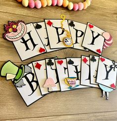 the happy birthday card game is laid out on a table with beads and other items