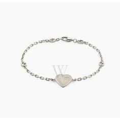 Crafted in sterling silver, this Gucci Heart bracelet features a mother-of-pearl enamel with engraving on the motif. Interlocking G bracelet with clasp. Gucci Ladies Bracelets. SKU: YBA645546003. Color: Silver-tone. Metal Type: Sterling Silver. Metal Stamp: 925-Sterling. Gem stone type: None. Bracelet style: 1 Band. Gucci Heart Bracelet With Interlocking G. Length 19 cm, weight 4.30g. Bracelet Style, Gem Stone, Heart Bracelet, Metal Stamping, Fashion Bracelets, Womens Bracelets, Types Of Metal, Mother Of Pearl, Silver Tone