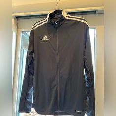 Adidas Men’s Soccer Jacket. Never Worn. Perfect For Spring Practice And Games. Black Adidas Functional Windbreaker, Adidas Black Sports Windbreaker, Adidas Functional Black Track Jacket, Functional Adidas Black Track Jacket, Adidas Black Track Jacket For Outdoor Activities, Adidas Black Sports Track Jacket, Adidas Black Track Jacket For Sports, Adidas Black Sportswear Outerwear, Adidas Black Outerwear For Outdoor Activities