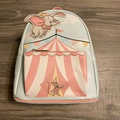 Host Pick Price Is Firm. This Dumbo Bundle Can’t Get Any Cuter. The Mini Backpack Is Absolutely Adorable And I Hate To Get Rid Of It, But I Can’t Be Bursting Into Tears All The Time. (Dumbo Is The Movie That Is Guaranteed To Make Me ). I Included A Stock Photo Of The Inside Of The Bag. It’s New With Tags, Only Displayed And Never Used. The Stuffed Dumbo Was An Impulse Buy And Has Been In A Box For Years (Indoors, No Storage Container Or Basement). And The Sticker Just Ties It All Together! Cute Standard Backpack For Theme Parks, Cute Standard Backpack For Theme Park, Playful Backpack For Theme Park, Dumbo Loft, Jack Skellington Santa, Monster Backpack, Loungefly Hello Kitty, Winnie The Pooh Honey, Leopard Print Bag