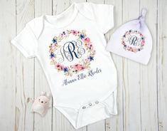 "Our personalized baby bodysuits capture the sweetest moment of your life with the name of your bouncing bundle of joy. Expertly printed onto exquisitely soft interlock knit, these cute baby clothes will offer you a unique way to announce your child to the world. Our baby clothing sets make the perfect baby shower gifts and are a favorite among new parents.  I am passionate about creating one of a kind baby keepsake unique to your little one. I will work with you closely to custom design your bl Personalized Cotton Onesie For Baptism, Personalized Fitted Onesie For Baptism, Baby Newborn Girl, Newborn Girl Gift, Monogrammed Baby Gown, Baby Knot Hat, Welcome Home Baby, Matching Baby