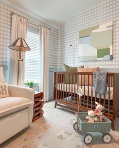 a baby's room is decorated in neutral colors