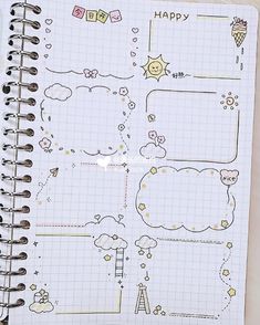 an open notebook with doodles and writing on it