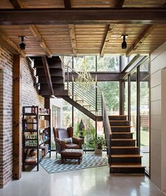 an image of a living room with stairs