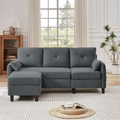 a living room scene with focus on the sectional sofa