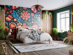 a bedroom with colorful wallpaper and wooden flooring, including a bed in front of a large window