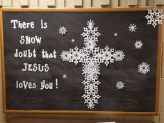 a blackboard with white snowflakes on it that says, there is snow doubt that jesus loves you