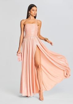 Redefine elegance with our radiant Jacie Dress. This stunner combines a layered design bodice, flowing floor-length skirt, and thigh-high slit, making it the perfect choice for any exquisite affair. Shown here in Peach. 95% Polyester, 5% Spandex Made in China Model is 5'110" wearing size XS Style No. SS23-6703 Peach Bridesmaid Dress, Peach Gown, Bridal Reception Dress, Australia Clothes, Bride Bachelorette, Bachelorette Party Bride, Peachy Keen, 2024 Color, Black Tie Dress