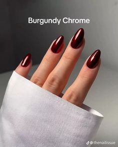 When it comes to burgundy chrome nails, there are so many design possibilities to choose from. Whether you prefer simple, elegant nails or something more detailed and artistic, the options are endless. Burgundy chrome gives off a high-shine, almost mirror-like effect that’s perfect for showcasing your nail art.  Some popular designs include adding intricate details like metallic stripes, tiny rhinestones, or subtle glitter accents. You can also try geometric patterns or mix in other colors like Holiday Classic Nails, Red Wine Crome Nails, Fall Nail Inspo Burgundy, Hailey Bieber Nails Burgundy, Chrome November Nails, Mocha Cherry Chrome Nails, Wine Red With Chrome Nails, Red Wine Fall Nails, Fall Chrome Nails Almond