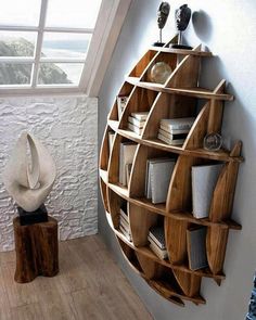 a wooden shelf with books on it and a white hat sitting on top of it