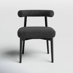 an upholstered chair with black wood frame and fabric seat, viewed from the side