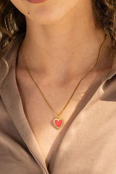 The Red Heart Necklace is a charming and vibrant accessory, featuring a heart-shaped pendant that adds a pop of color and sentiment to any outfit. Water Resistant Brass 24K Gold with 24k Gold Pendant Handmade Hypoallergenic Nickel Free SIZE:13"+ 3" extender. Pendant 0.62" x 0.3". Closure: Lobster Clasp Trendy Red Heart Pendant Necklace, Trendy Red Necklace With Heart Charm, Trendy Red Heart Necklace For Valentine's Day, Trendy Double Heart Necklace For Valentine's Day, Trendy Red Heart Pendant Jewelry, Trendy Heart Pendant Necklace For Valentine's Day, Trendy Heart Charm Necklace For Valentine's Day, Gold Heart Necklace With Heart Print For Valentine's Day, Trendy Heart Necklace For Valentine's Day Gift