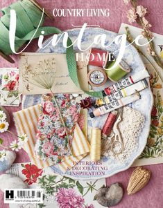 the cover of country living's vintage home magazine, featuring flowers and other items