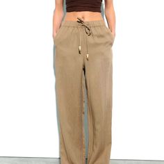 Zara High-Waisted Pants With Elastic Drawstring Waistband Front Pockets, Wide Leg Color: Mid-Camel Fabric:Lyocell/Viscose Size: M New With Tags! Trendy Khaki Summer Pants, Trendy Summer Khaki Pants, Brown Bottoms With Elastic Waistband For Spring, Brown Bottoms For Fall Vacation, Spring Brown Bottoms With Elastic Waistband, Chic Relaxed Fit Khaki Bottoms, Khaki Wide Leg Pants For Summer, Chic Khaki Wide Leg Pants With Elastic Waistband, Beige Vacation Bottoms For Fall