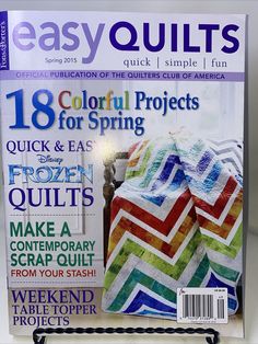 the front cover of easy quilts magazine with an image of a colorful blanket on it