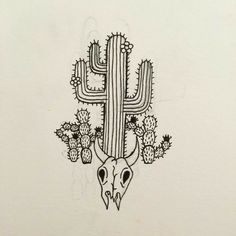 a drawing of a cactus with a skull in the middle