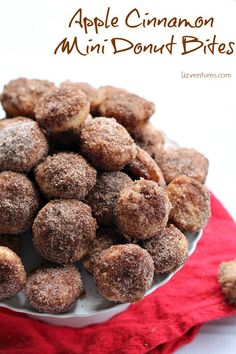 a plate full of apple cinnamon mini donut bites on a red napkin with the title above it