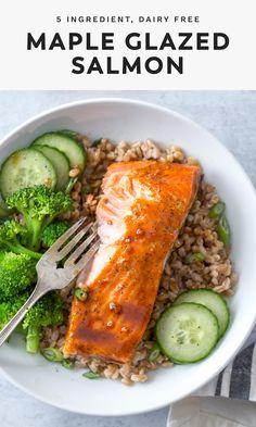 a plate with salmon, rice and cucumbers on it that says maple glazed salmon