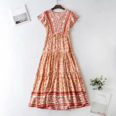 The Most Gorgeous, Vibrant Boho Chic Dress With Amazing Detail. 100% Cotton, This Dress Is A Summer Fall Capsule Piece, Elevating Your Look Instantly. 100% Cotton Material Measurements Small: Shoulder - 38cm Bust - 88cm Waist - 66cm Length - 124cm Medium: Shoulder - 39cm Bust - 92cm Waist - 70cm Length - 125cm Large: Shoulder - 40cm Bust - 96cm Waist - 74cm Length - 126cm Pink Printed Tiered Dress, Pink Boho Print Short Sleeve Maxi Dress, Pink Flowy Boho Dress With Short Sleeves, Pink Boho Print Maxi Dress With Short Sleeves, Bohemian Pink Tiered Midi Dress, Bohemian Tiered Pink Midi Dress, Casual Pink Short Sleeve Boho Dress, Pink Short Sleeve Boho Summer Dress, Pink Boho Dress With Short Sleeves For Summer