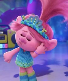 a cartoon character with pink hair and blue dress