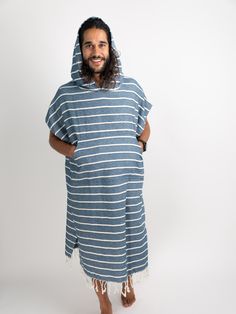 Change and dry off anywhere with a stylish lightweight Nova Blue Poncho Towel. Our poncho will allow you to get changed discreetly, and protect you from the elements, while at the waterside. A must have for any beach bag. THE PERFECT SIZE - Our beach coverup comes in adult one size fits all. The sizing means It will comfortably fit most adults and big kids. Width: 33" x Length: 37”. The perfect beach gift for anyone who enjoys an outdoor lifestyle like surfers, swimmers, and triathletes 100% TUR Poncho Towel, Beach Poncho, Beach Gifts, Us Beaches, Swimmers, Beach Accessories, Outdoor Lifestyle, Navy Stripes, Terry Cloth