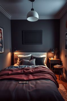 a bed sitting in a bedroom next to a wall with pictures hanging on the walls