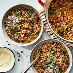 three bowls filled with soup on top of a table