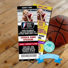 a basketball ticket sitting on top of a wooden floor next to a basketball and ball