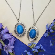 Semi-precious stone on a vintage brass, antiqued silver, or shiny silver oval locket, perfect to remember your loved ones. On 28 inches of antiqued brass chain. Choose from: Light Blue Sodalite, Blue Howlite, Blue Agate or Dark Blue Sodalite. I can change the chain to any length, just leave a note at checkout. Blue Howlite, Vintage Locket, Oval Locket, Oval Necklace, Compass Necklace, Vintage Lockets, Spring Accessories, Blue Sodalite, Blue Agate