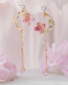 These earrings feature a design inspired by Chinese classical aesthetics, showcasing asymmetrical floral motifs that echo the grace of ancient beauty. Elevate your style with these distinctive dangle earrings, perfectly blending tradition with a contemporary flair for a truly enchanting look. **Product name** Chinese Classic Ancient Beauty Floral Style Asymmetry Drop Dangle Earrings **Size** Pink - Length: 8.9 cm; Width: 2.2 cm Green With Cat - (L) Length: 8.3 cm; Width: 1.3 cm; (R) Length: 5.9 cm; Width: 1.6 cm Green With Butterfly - (L) Length: 11.7 cm; Width: 1.8 cm; (R) Length: 10.5 cm; Width: 1.9 cm Red - (L) Length: 7.5 cm; Width: 2.0 cm; (R) Length: 5.7 cm; Width: 1.8 cm Blue - (L) Length: 7.8 cm; Width: 1.3 cm; (R) Length: 6.5 cm; Width: 1.3 cm **Packaging** - Each order is thought Hand Painted Earrings, Painted Earrings, Tassel Drop Earrings, Mismatched Earrings, Statement Drop Earrings, Long Dangle Earrings, Summer Earring, Floral Earrings, Bridesmaid Jewelry