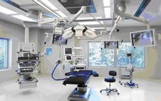 an operating room with multiple monitors and medical equipment in it's centerpieces