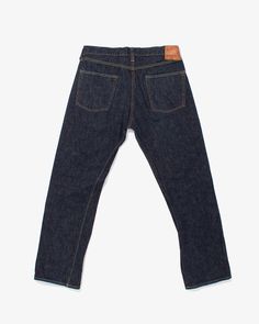 Carefully selected and imported from Japan, these vintage selvedge jeans have their own characteristics from over the years making them uniquely their own. These jeans are a great example of the variety of denim Japan has to offer. Owned by Toyo Enterprises in Japan, Sugar Cane is inspired by vintage and iconic American workwear of the late 19th century and early 20th. Well-known in the 1990s for their meticulous attention to detail, Sugar Cane reproduces high-quality denim products aiming to ca Indigo Selvedge Rigid Denim Bottoms, Tapered Leg Jeans In Rigid Denim With Double-needle Stitching, Selvedge Straight Fit Jeans With Standard Cut Leg, Selvedge Recycled Denim Tapered Leg Jeans, Selvedge Rigid Denim Blue Pants, Denim Blue Selvedge Rigid Denim Pants, Selvedge Dark Wash Standard Cut Pants, Dark Wash Selvedge Pants With Standard Cut, Dark Wash Selvedge Pants