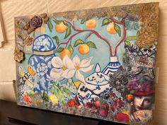 a painting on the side of a wall with flowers and vases painted on it