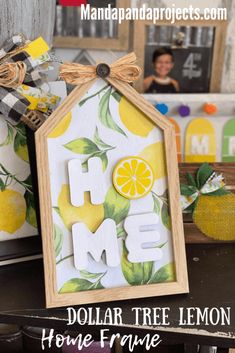 a house made out of wood with lemons on it and the word home painted in white