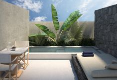 an outdoor patio with table and chairs next to a pool