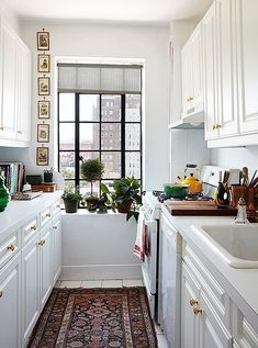 Matthew Marden and Bobby Graham's West Village Abode West Village Apartment, Galley Kitchen Design, Galley Kitchens, Galley Kitchen, Kew Gardens, Apartment Kitchen, Tiny Kitchen, Ikea Kitchen, White Kitchen Cabinets