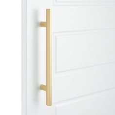 an open door with a handle on the front and side panels, in white painted wood