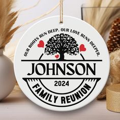 personalized family reunion ornament with tree and hearts on the front in white