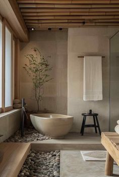 Step into a world where the calm of Scandinavia meets the zen of Japan, creating bathrooms that are as thoughtfully designed as they are beautiful. These #scandinavian #bathroom Bathroom Natural Stone, Resort Bathroom, Estilo Japandi, Spa Inspired Bathroom, Zen Bathroom, Japandi Design, Minimalist Kitchen Design