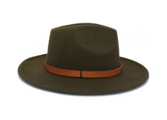 Type: Center Dent Wide Brim Fedora Adjustable Size: With a tie of a knot, adjust the fit of your hat to the ideal size from 21 ¼ to 23 ¼ inches. Dimensions: Wired Brim: 2 7/8", Crown: 4" Color: Olive Green Materials: 65% Cotton, 35% Polyester Genuine Leather Hat BandMushroom JasperHand Stitched "Rays of Light" Embroidery Origin: All of our hats begin in Ecuador as the body is molded, then completed at our studio in Tucson, AZ. Here we shape, trim and handcraft all of the hatbands, leather goods, Adjustable Green Fedora Felt Hat, Adjustable Green Wide Brim Fedora, Green Adjustable Wide Brim Fedora, Adjustable Green Flat Brim Fedora, Adjustable Green Wide-brim Fedora, Adjustable Green Fedora Hat Band, Adjustable Wide Brim Green Felt Hat, Adjustable Brown Fedora With Flat Bill, Adjustable Green Hats For Fall