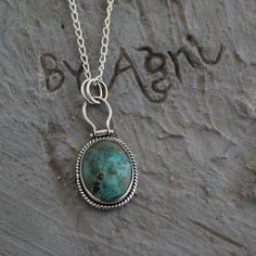 Bohemian Turquoise Cabochon Necklace With Round Pendant, Bohemian Oval Turquoise Necklace Nickel-free, Bohemian Oval Turquoise Necklace Nickel Free, Bohemian Turquoise Necklace With Large Sterling Silver Stone, Bohemian Turquoise Cabochon Necklace With Oval Pendant, Bohemian Turquoise Cabochon Oval Pendant Necklace, Turquoise Chrysocolla Oval Pendant Necklace, Bohemian Turquoise Oval Cabochon Pendant Necklace, Bohemian Turquoise Sterling Silver Necklace