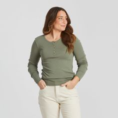 When the ageless appeal of a henley meets the comfort and durability of premium cotton, you get a closet staple for many years to come. Score! This thoughtfully-constructed henley fits close to the body without feeling restrictive, so you can wear it as is or layered under your favorite sweatshirt or cardigan. 50% USA Grown Cotton, 50% Modal Made with fabric-washed USA grown cotton/modal blend rib that's incredibly soft and comfortable. Self-fabric functional button up henley opening with small Cotton Ribbed Top With Henley Neckline, Cotton Henley For Everyday, Henley Long Sleeve, Casual Trends, Boxy Tee, Graphic Tees Vintage, Matching Tees, Back Women, Help Kids