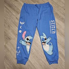 New Without Tags Disney Sweatpants! Super Cute & Comfy Lilo & Stitch Disney Sweatpants. These Have Pockets & A Drawstring Waist. Color: Blue Size: 3x Feel Free To Send Me An Offer. Cute Cartoon Print Bottoms For Sleepover, Cute Blue Pants With Pockets, Cotton Cartoon Print Pants For Loungewear, Casual Cartoon Print Pants For Loungewear, Cotton Pants With Cartoon Print For Loungewear, Cotton Lounge Pants With Cartoon Print, Casual Bottoms With Cartoon Print For Sleepovers, Casual Character Print Loungewear Bottoms, Cotton Loungewear Bottoms With Character Print